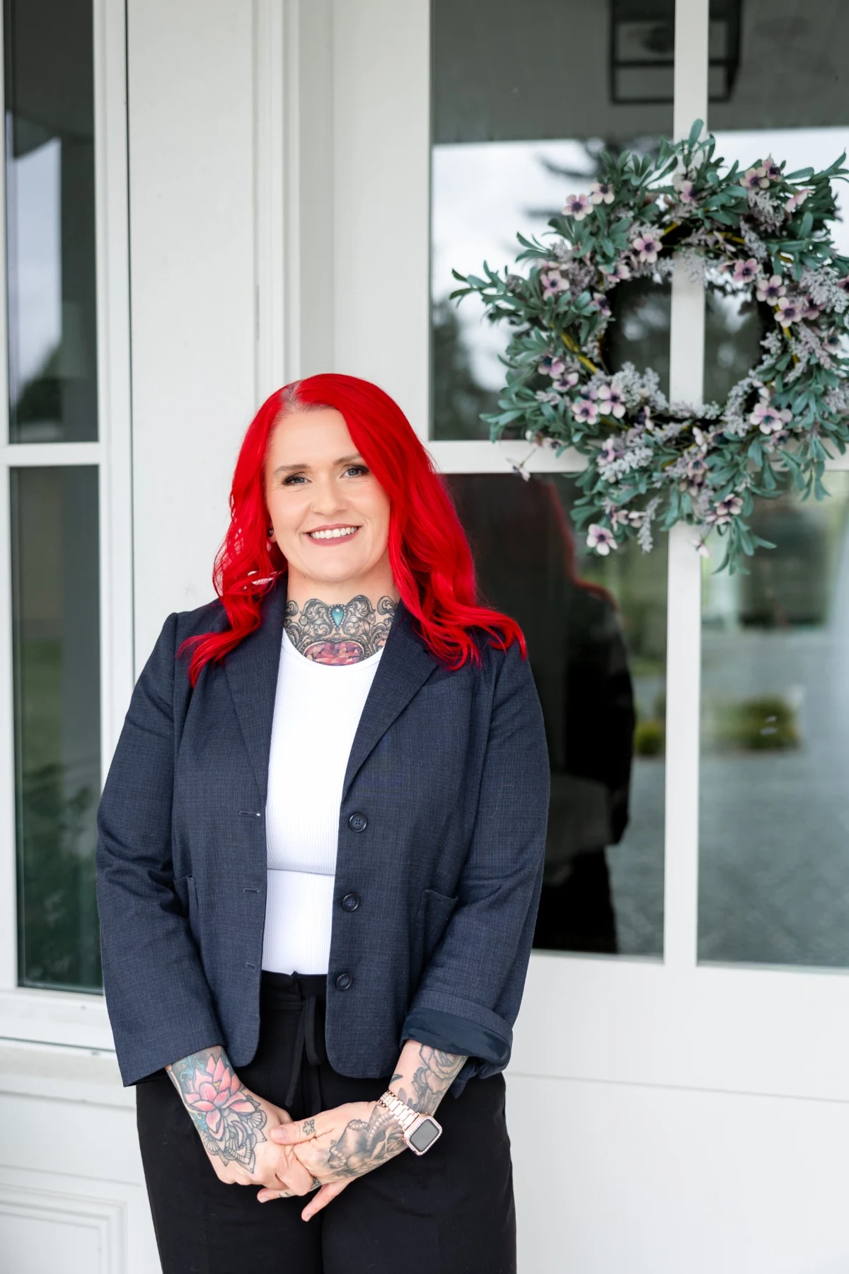 Robyn Graham smiling outside a home